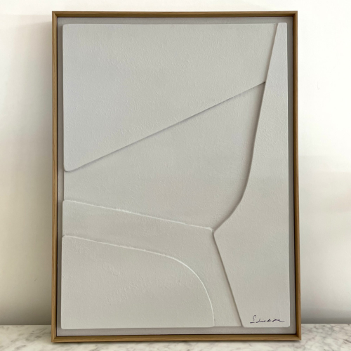 cuadro en relieve y madera gris